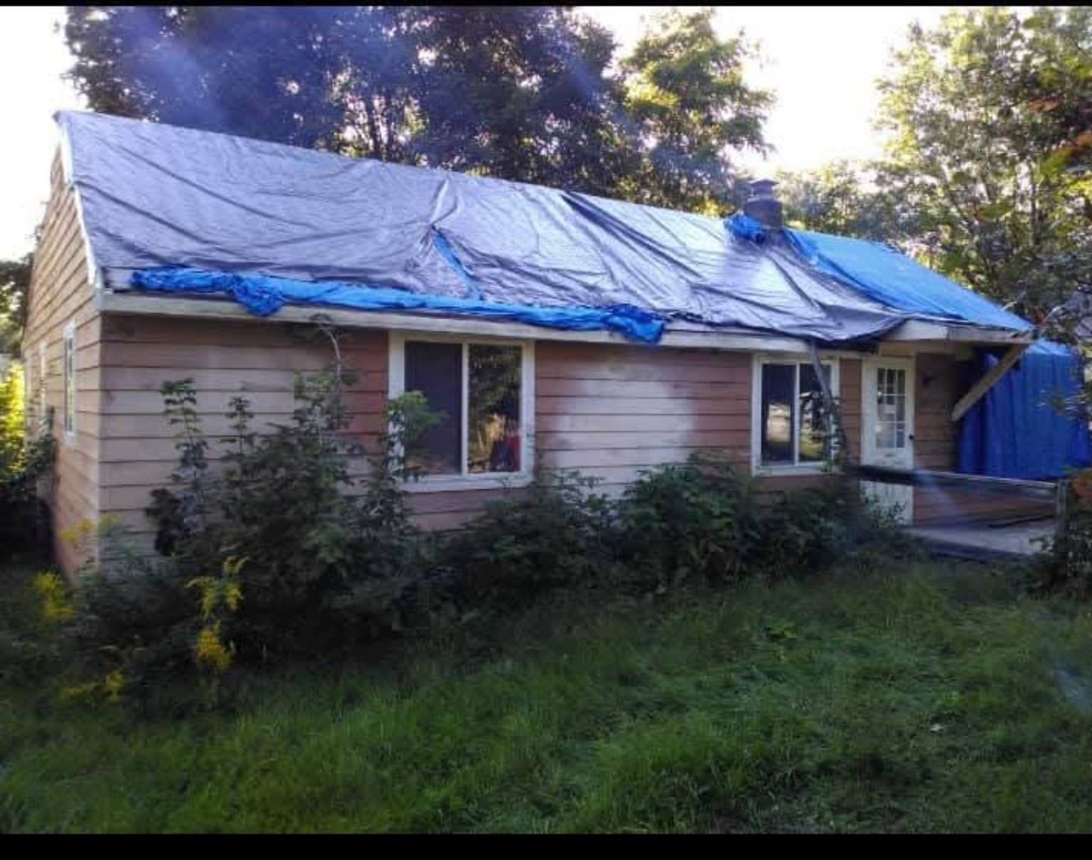 Exterior roof and siding renovation before renovation