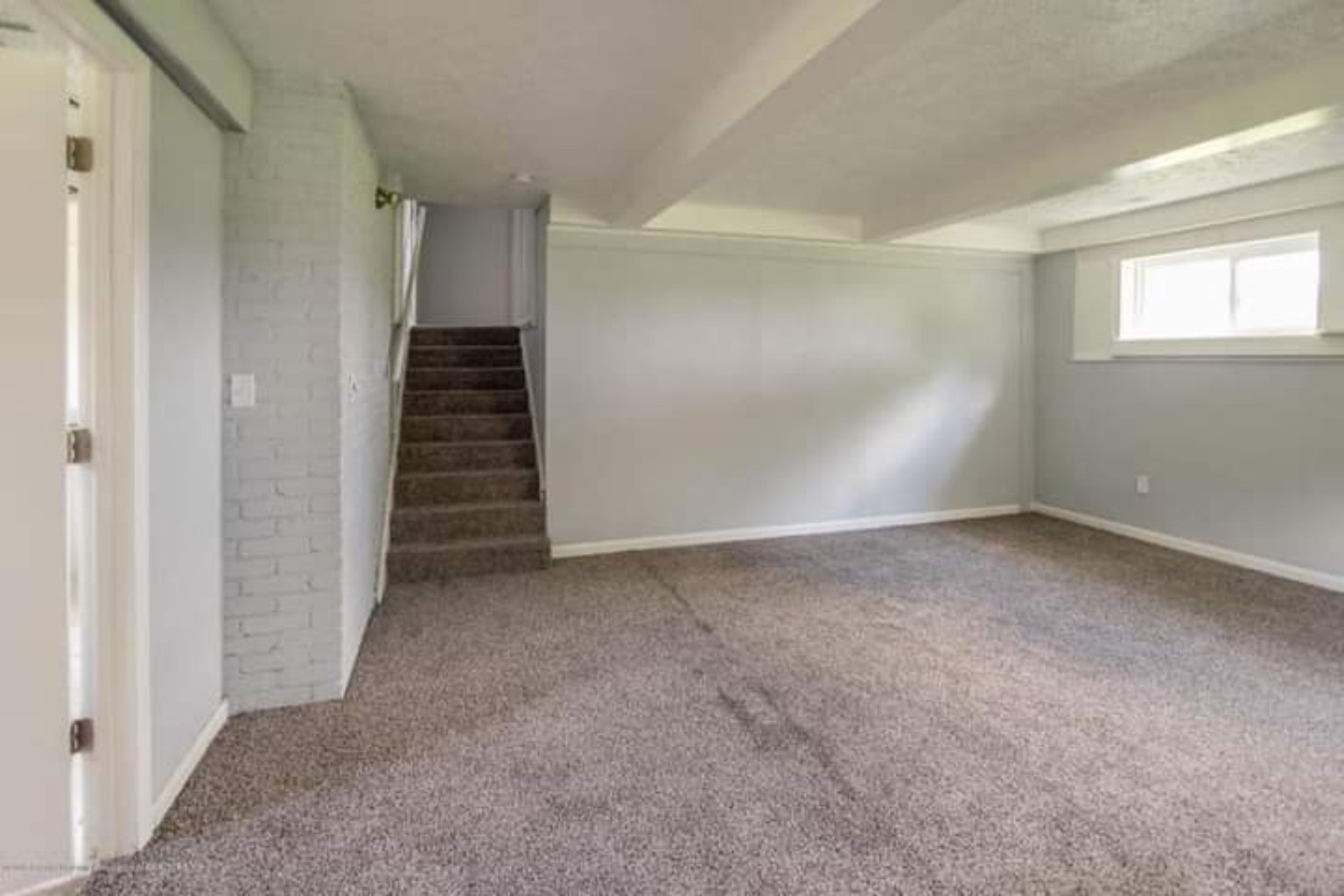 Lower-level living space after renovation